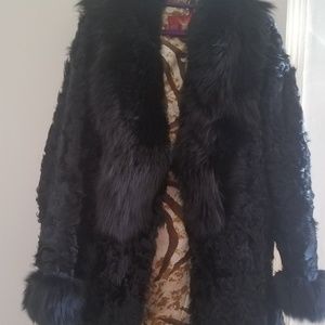 Trimmed  lamb fur coat  with  fox  fur  collar